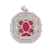 Elegant red ruby sterling silver pendant, featuring a sparkling gemstone in intricate design.